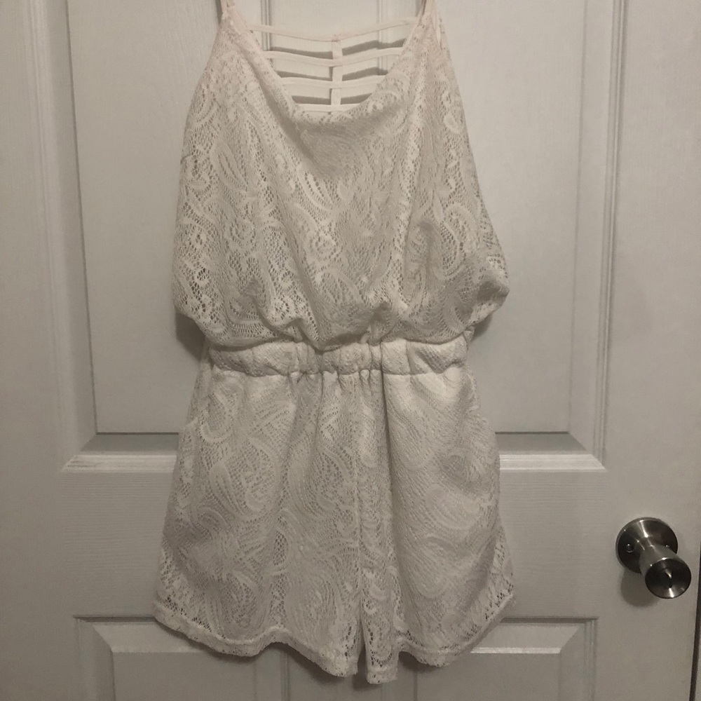 Size medium white Liberty Love romper.